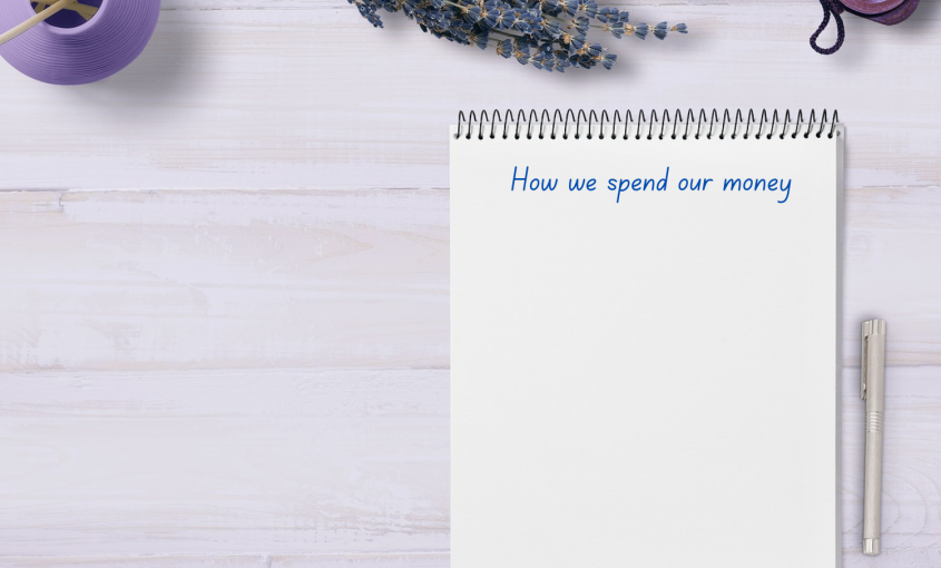 Notepad with title 'How we spend our money'